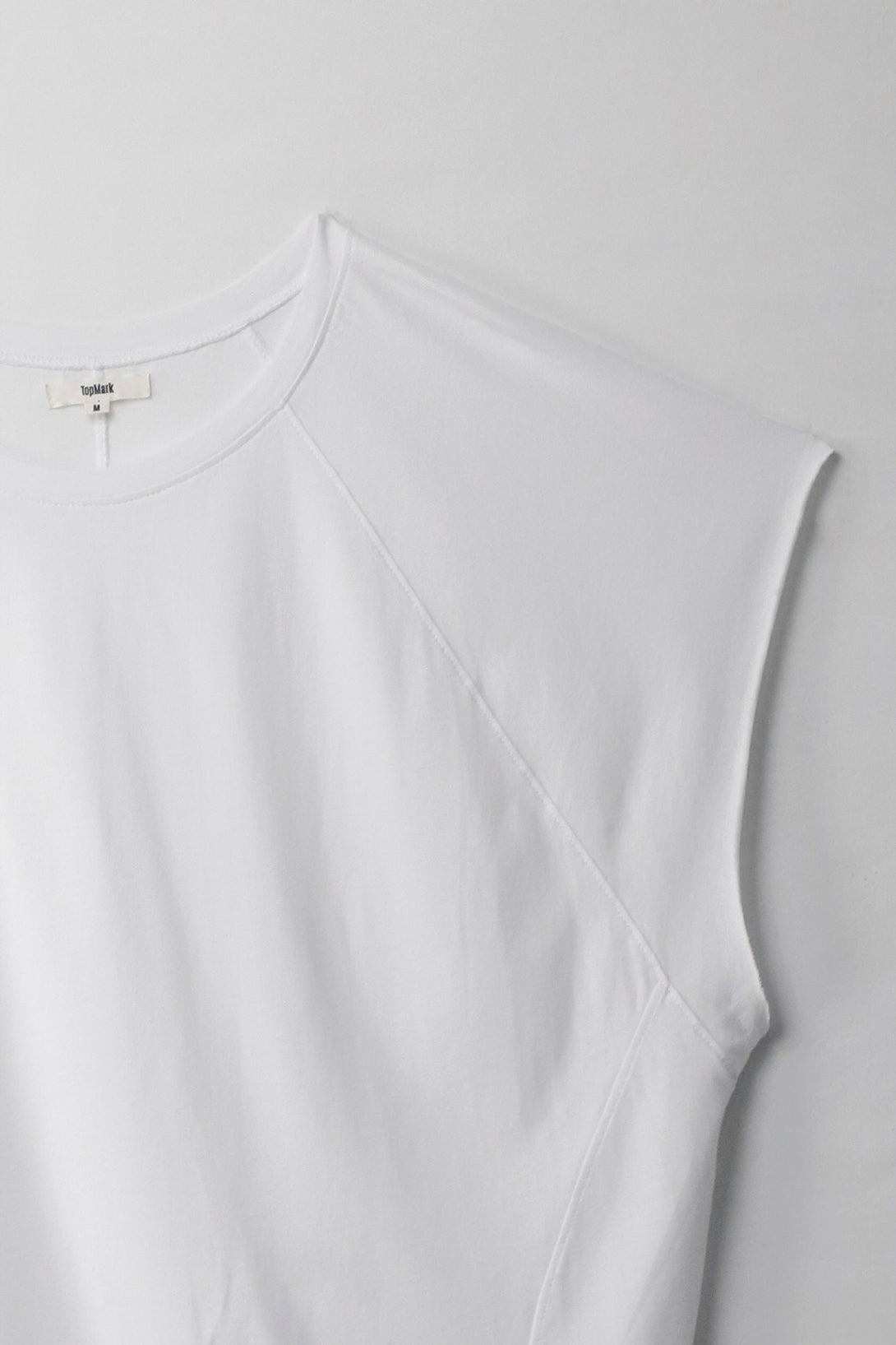 Camiseta con cortes verticales blanca para mujer