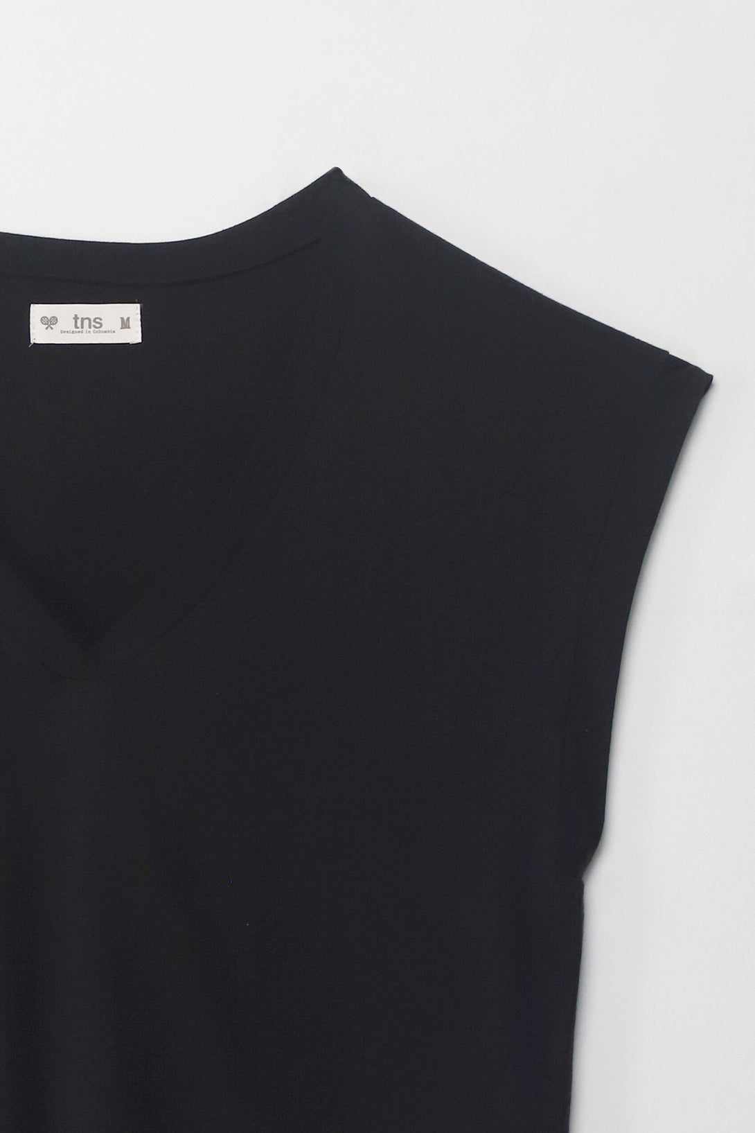 Camiseta manga sisa negra para mujer