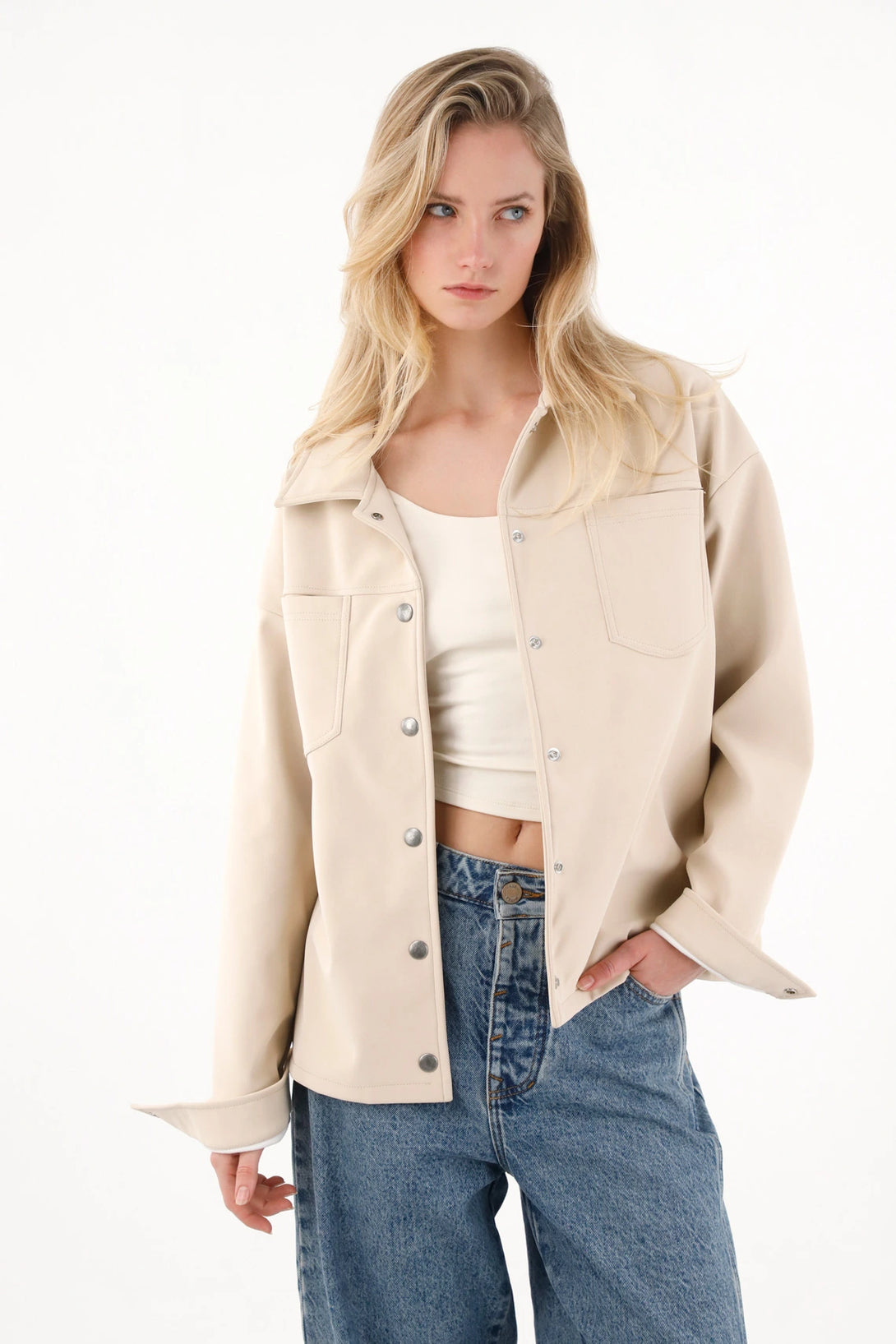 Chaqueta en cuero sintético crudo para mujer