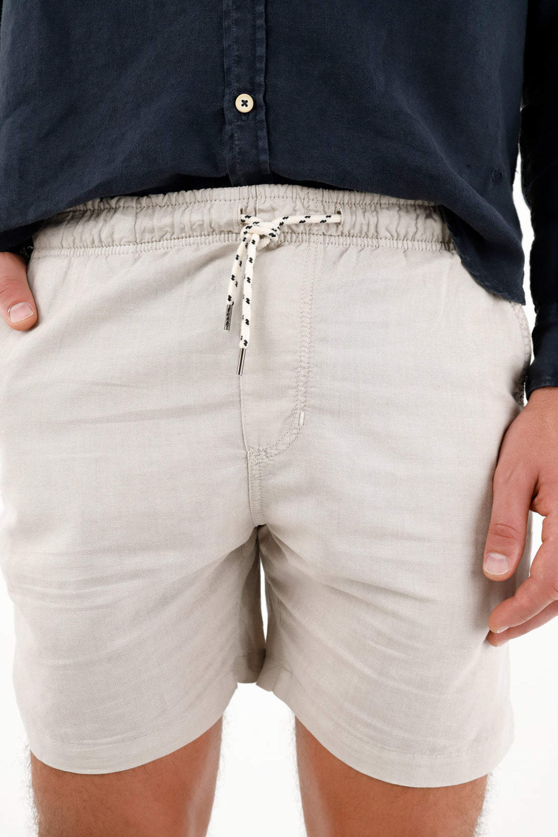 Men's gray bermuda shorts with adjustable drawstring.