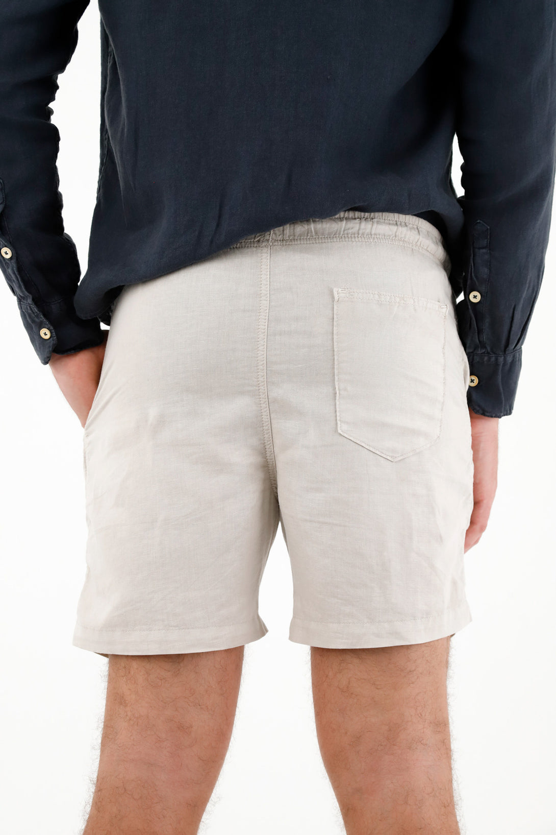 Men's gray bermuda shorts with adjustable drawstring.