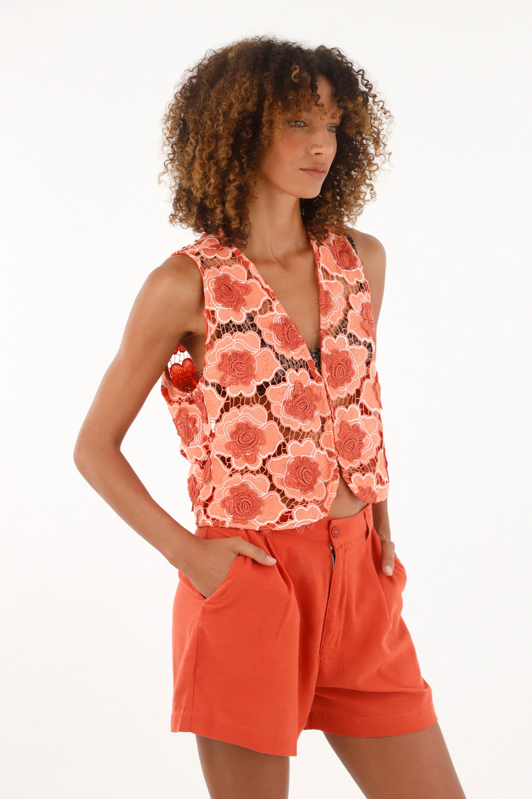 Women's orange flowing fabric bermuda shorts