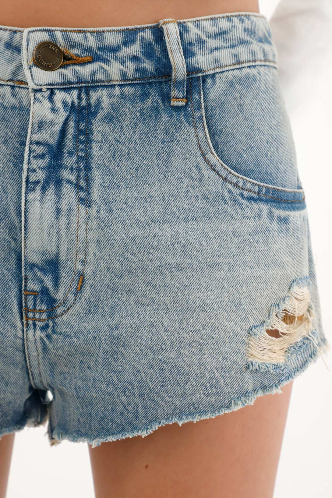 Women's denim shorts with rips and distressing