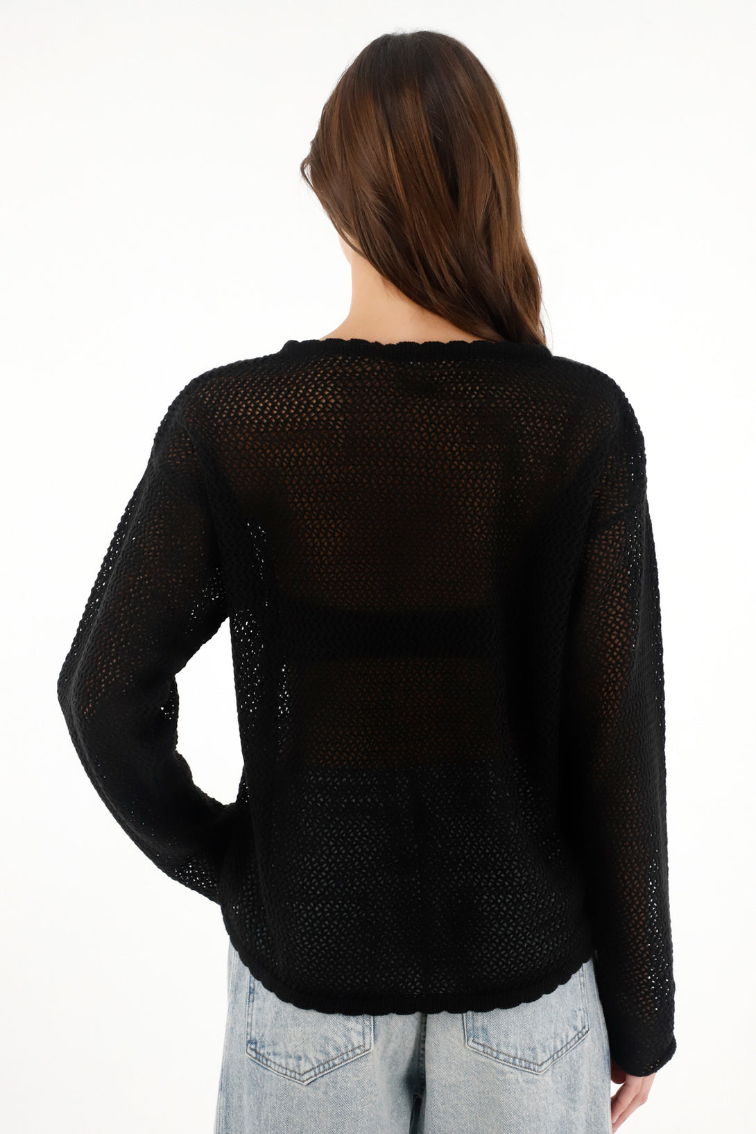 Buzo en tejido abiero con diseño de flores negro para mujer