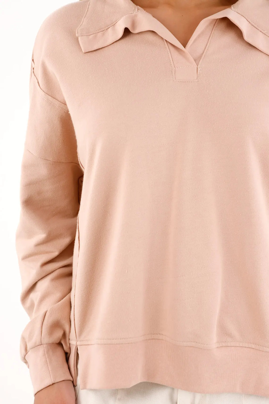 Buzo tipo polo amplio rosado para mujer