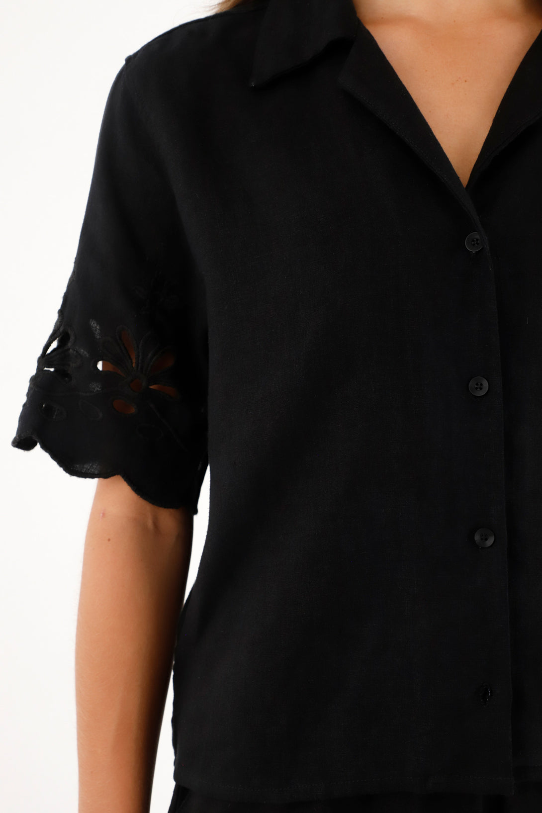 Women's black shirt with keyhole sleeves