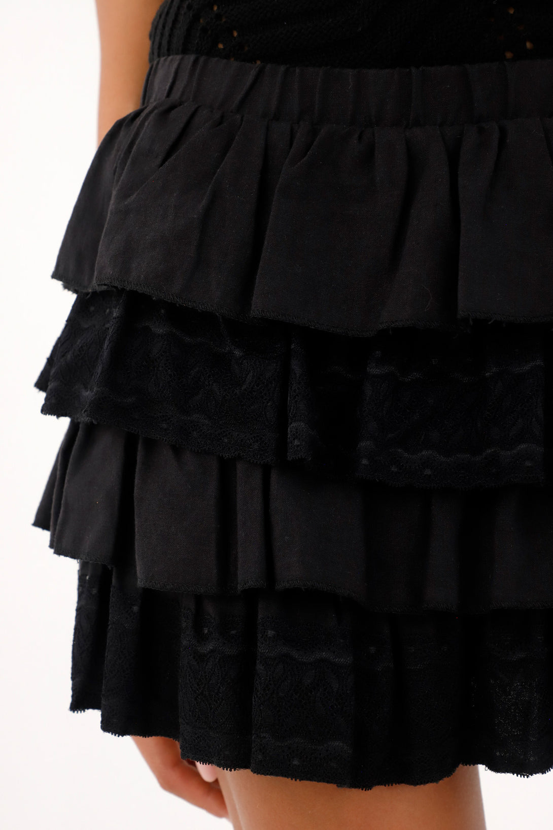 Falda corta negra con boleros para mujer