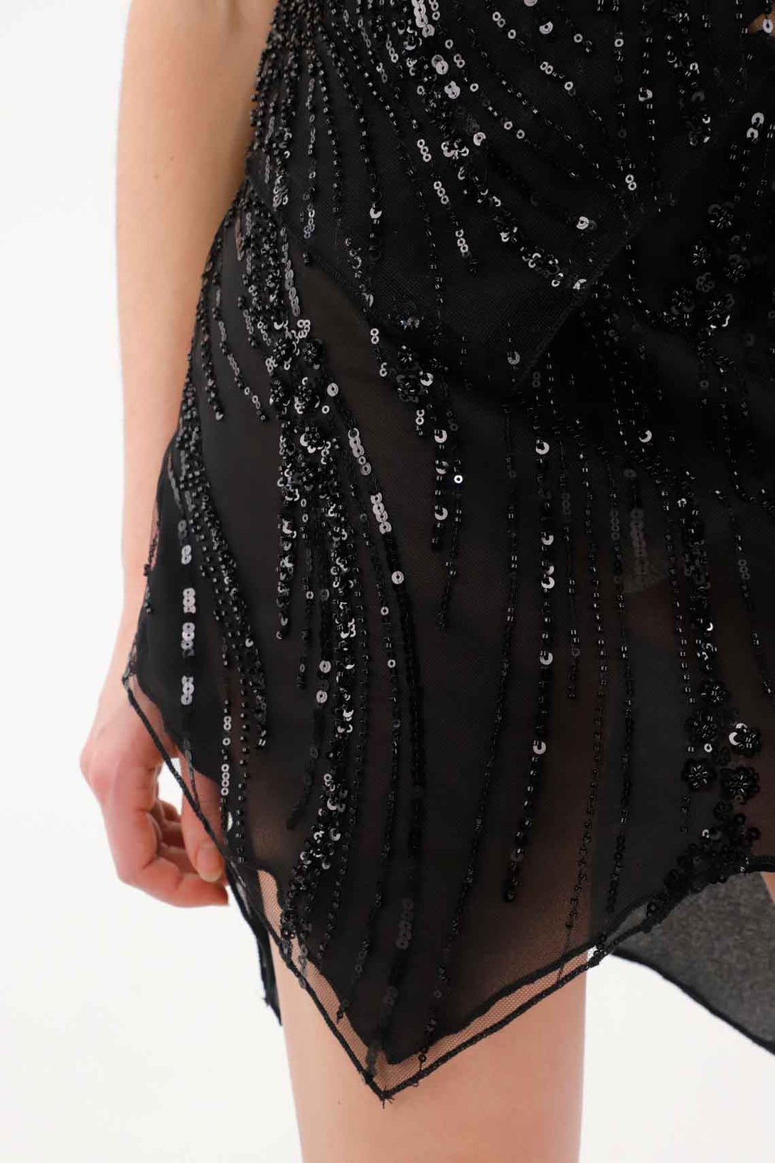 Falda corta de lentejuelas negra para mujer