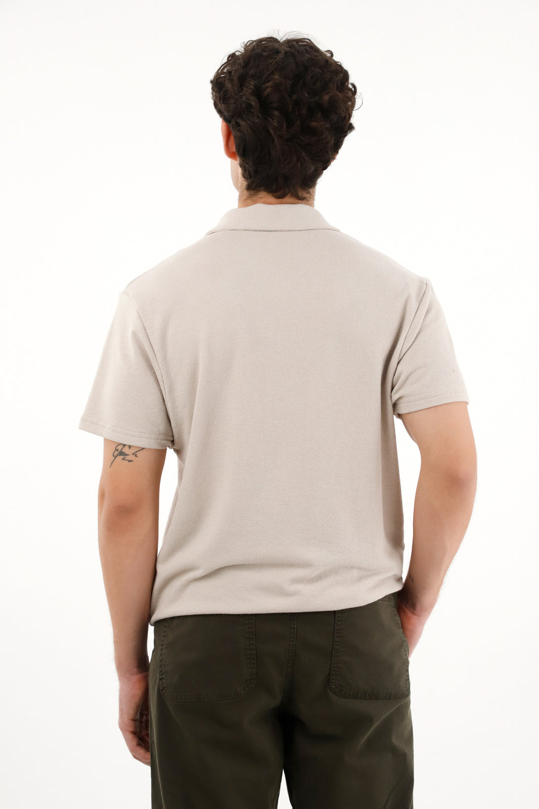 Polo gris en tela jersey con raqueta bordada para hombre