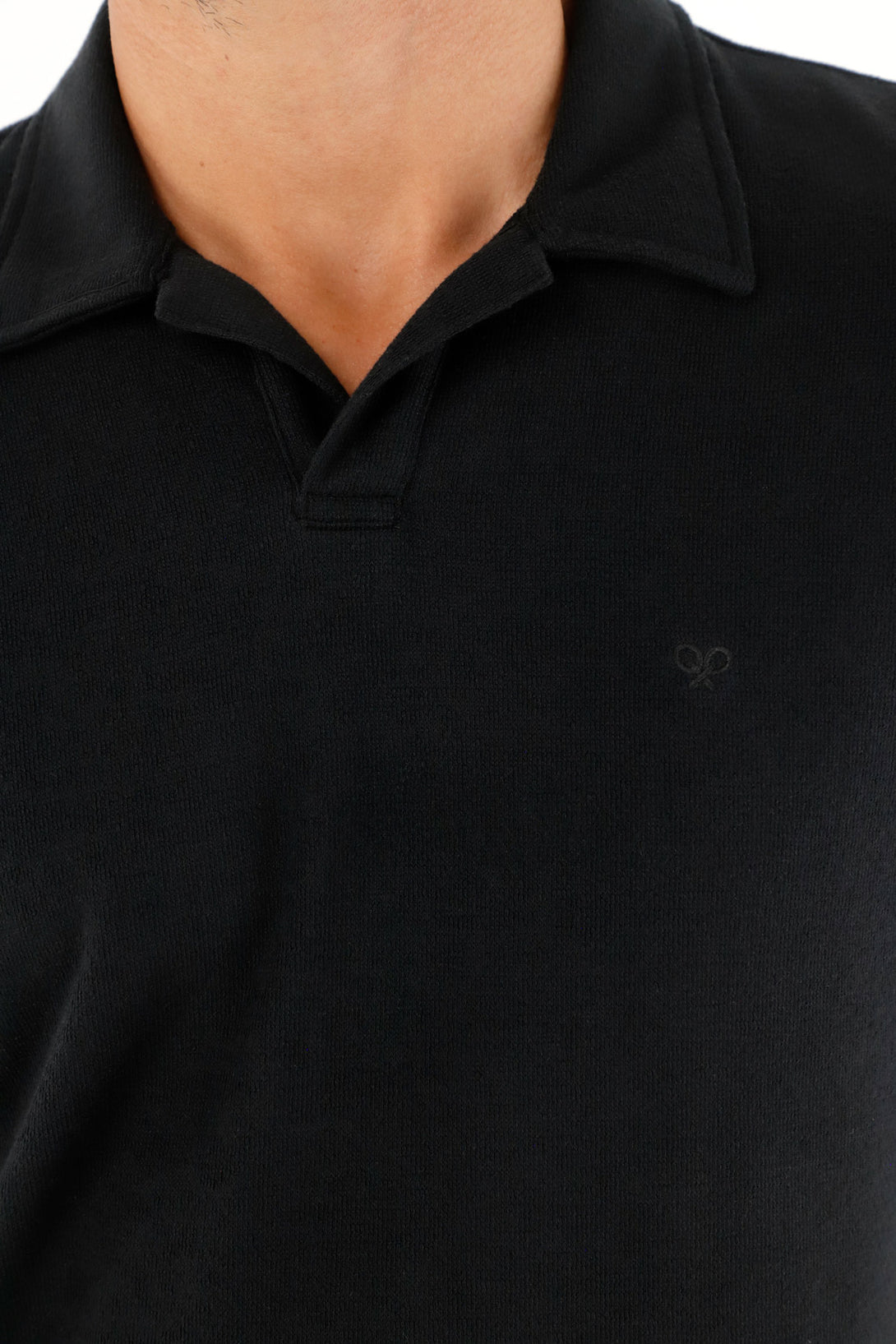 Polo negra en tela jersey con raqueta bordada para hombre