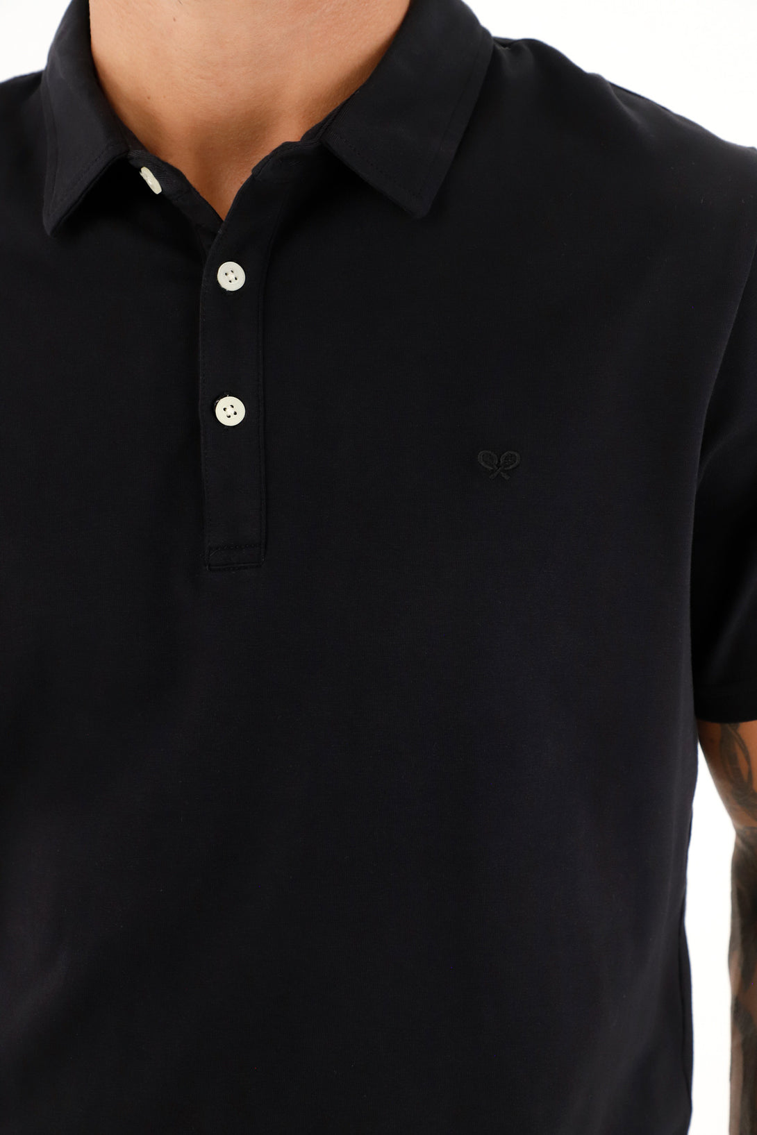 Polo negra con raqueta bordada para hombre