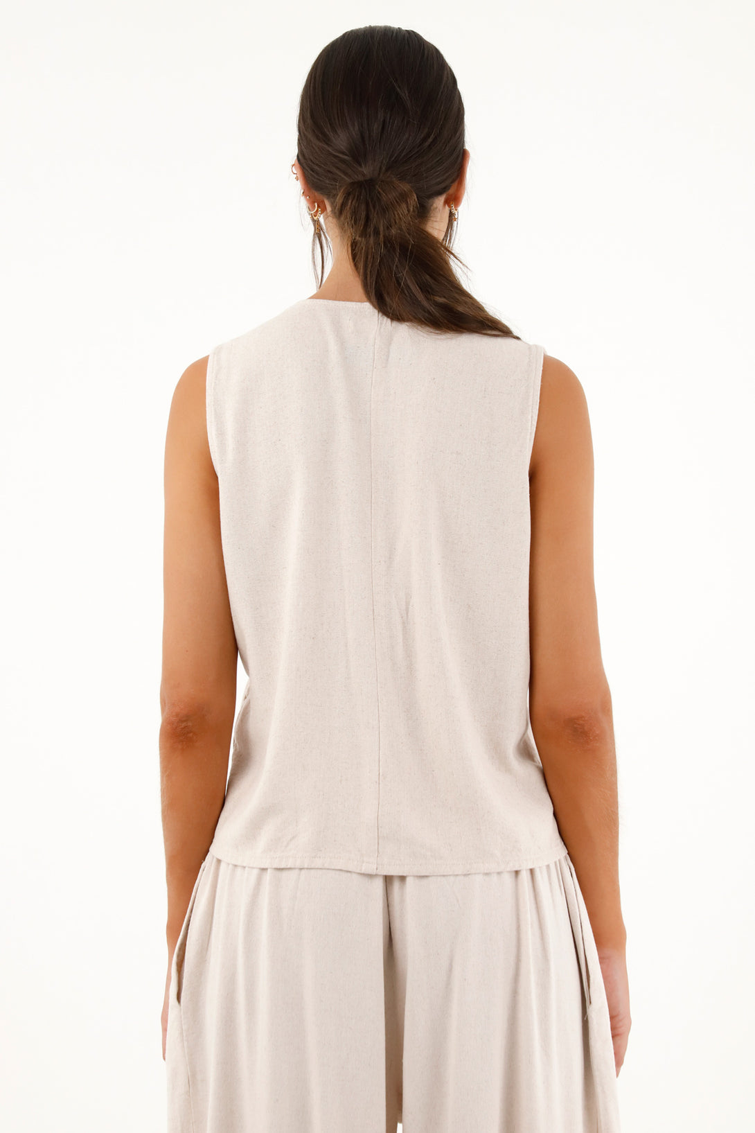 Women's cream vest with front cutouts