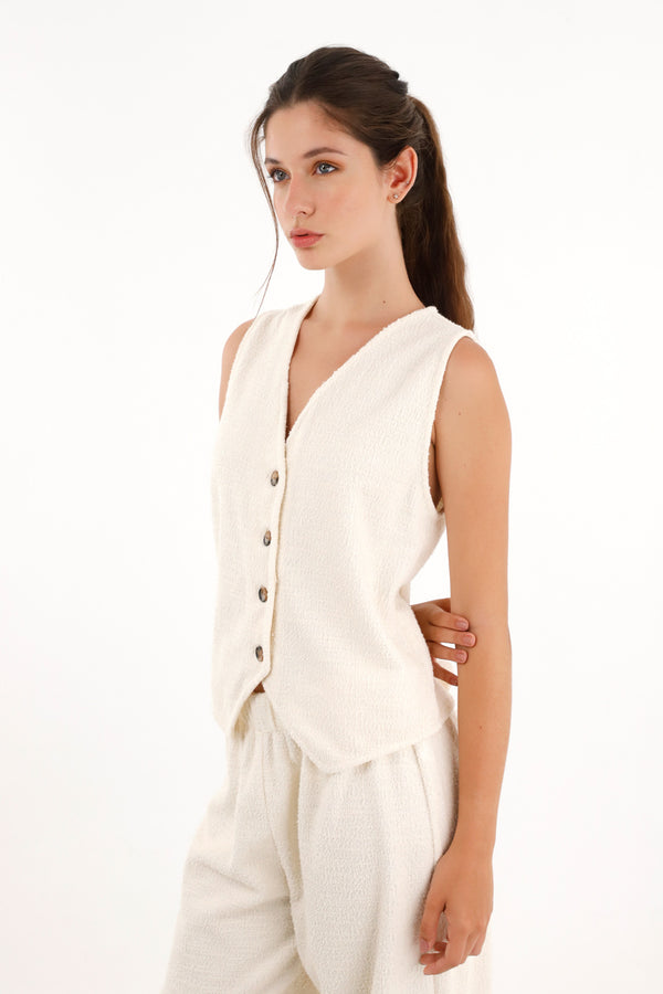 Chaleco tejido tipo tweed crudo para mujer