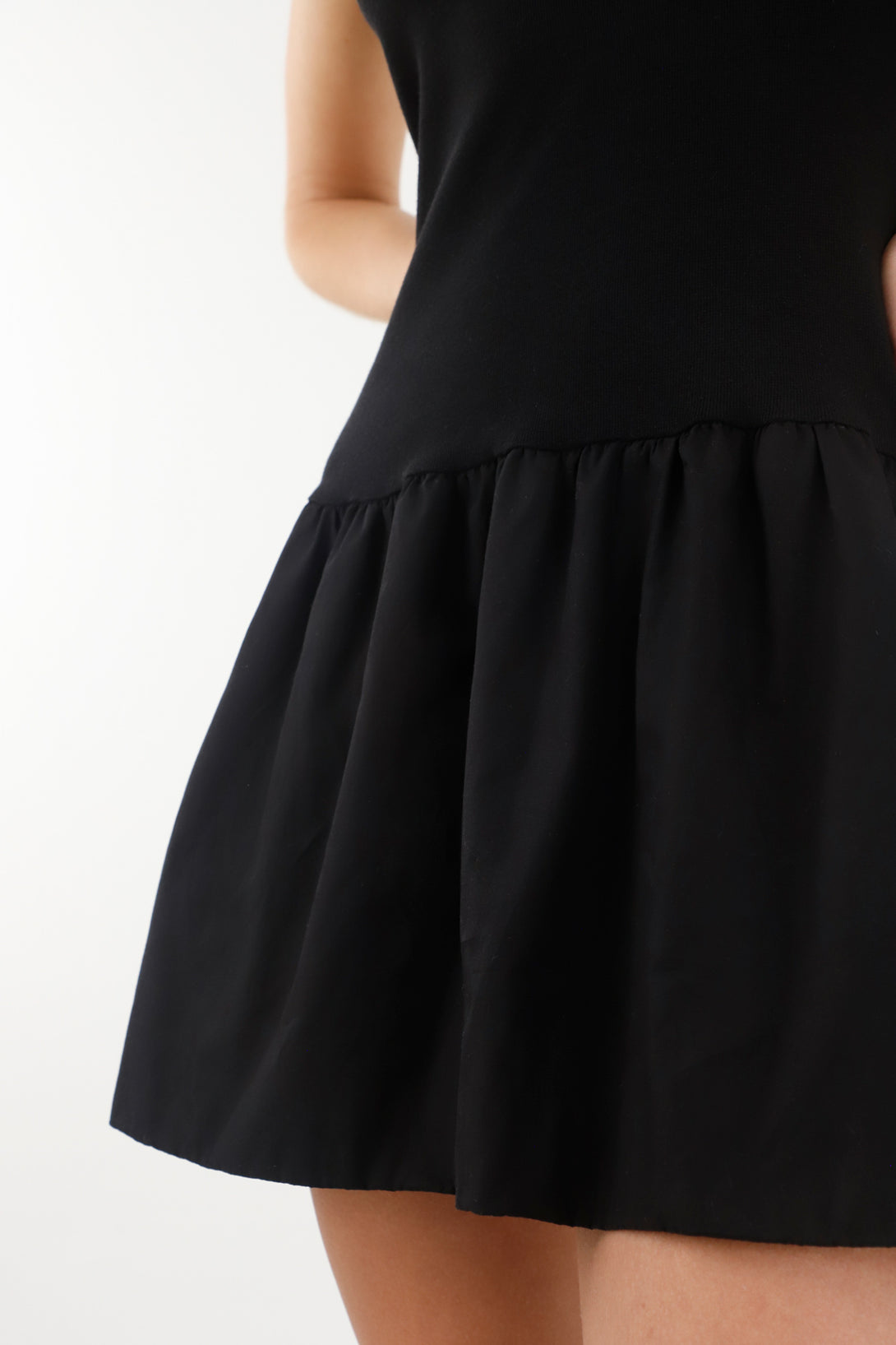 Women's short black dress with straps