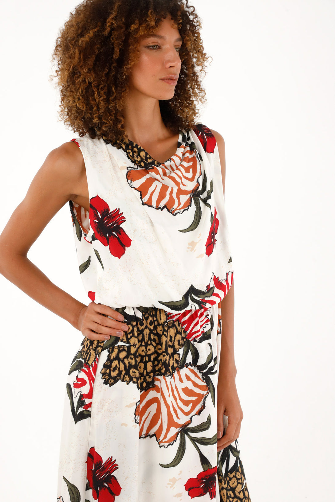 Women's sleeveless mixed print dress.